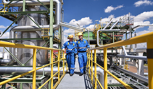Workers inspecting gas platform